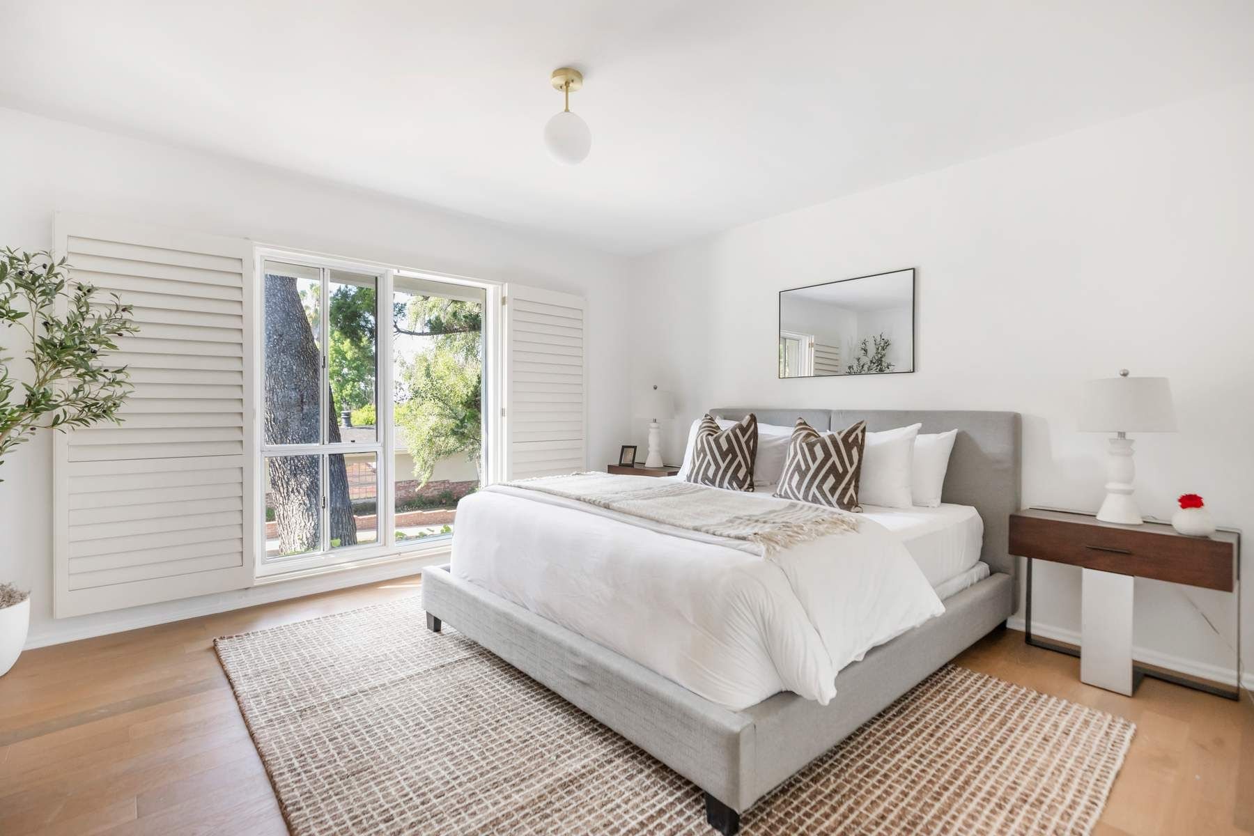 Primary bedroom with garden view