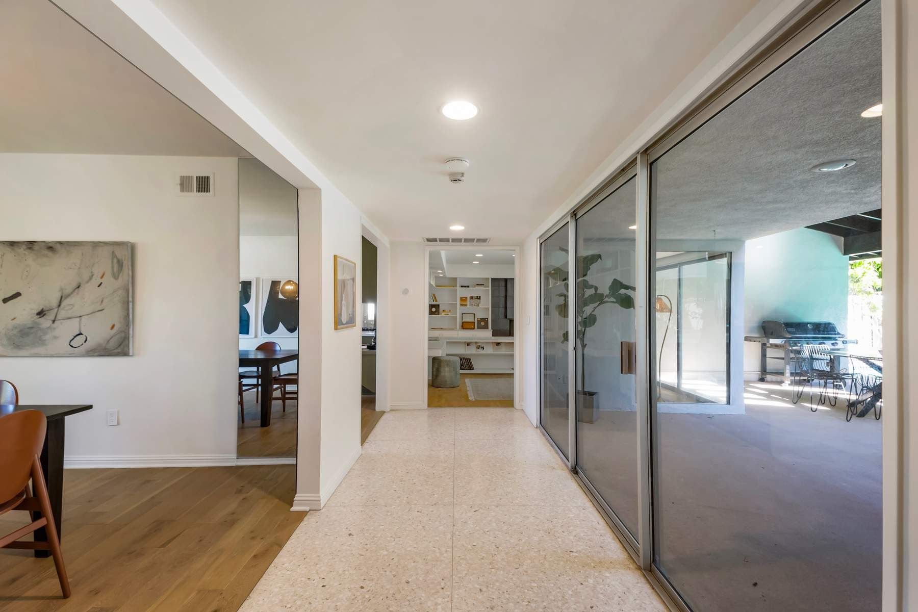 Living room opening to the pool