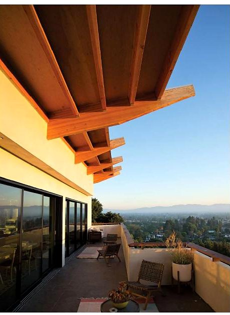 Sunset deck with timber eaves and city views